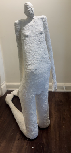 Kneeling Figure, 2025, Paper mache, 40 x 11 x 23 inches