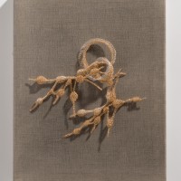 Tethered (there is a pain), 2025, 12K gold-filled wire and silver-plated wire, 11 x 14 x 3”